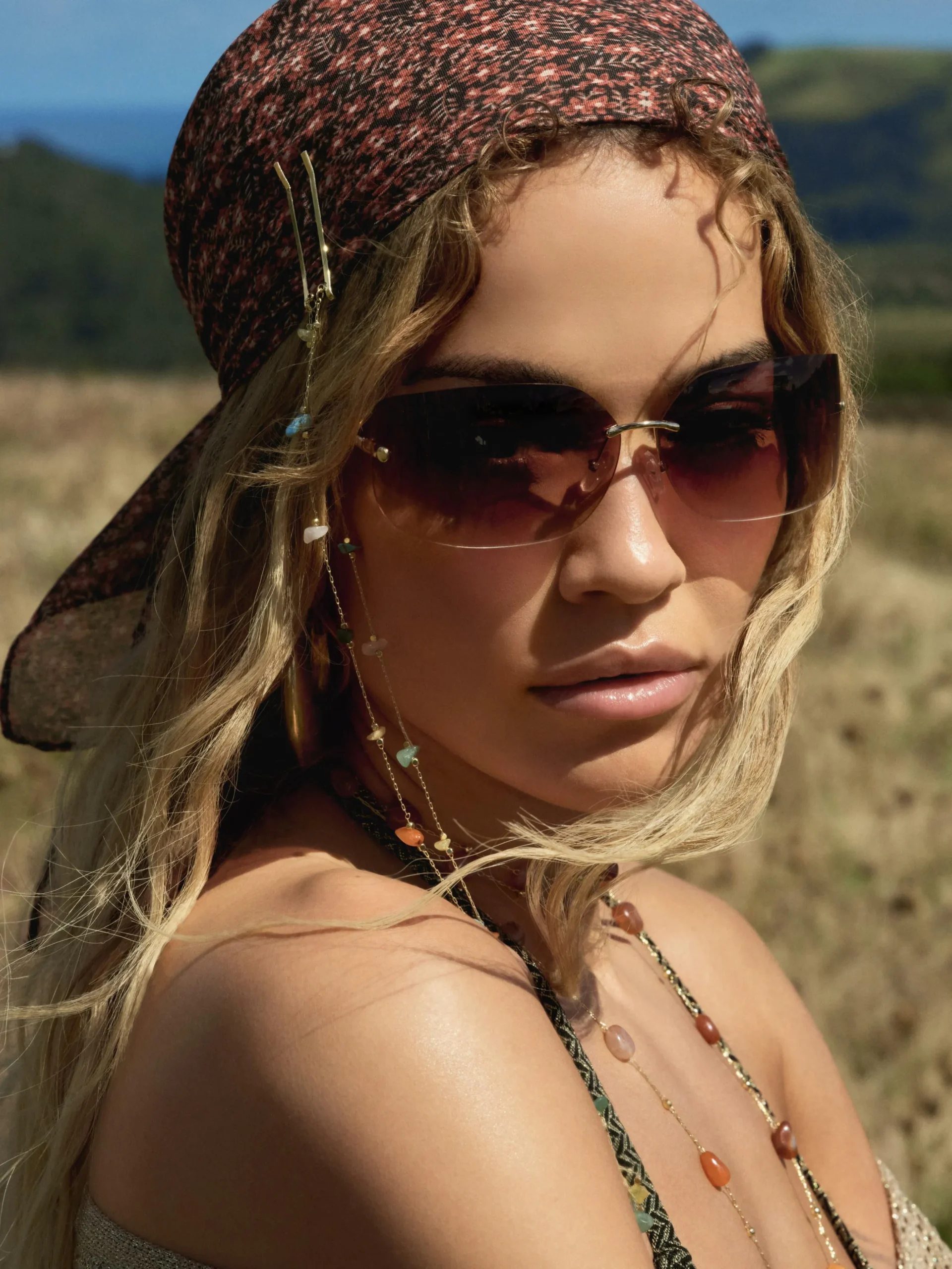 Rita Ora Curved Rimless Sunglasses
