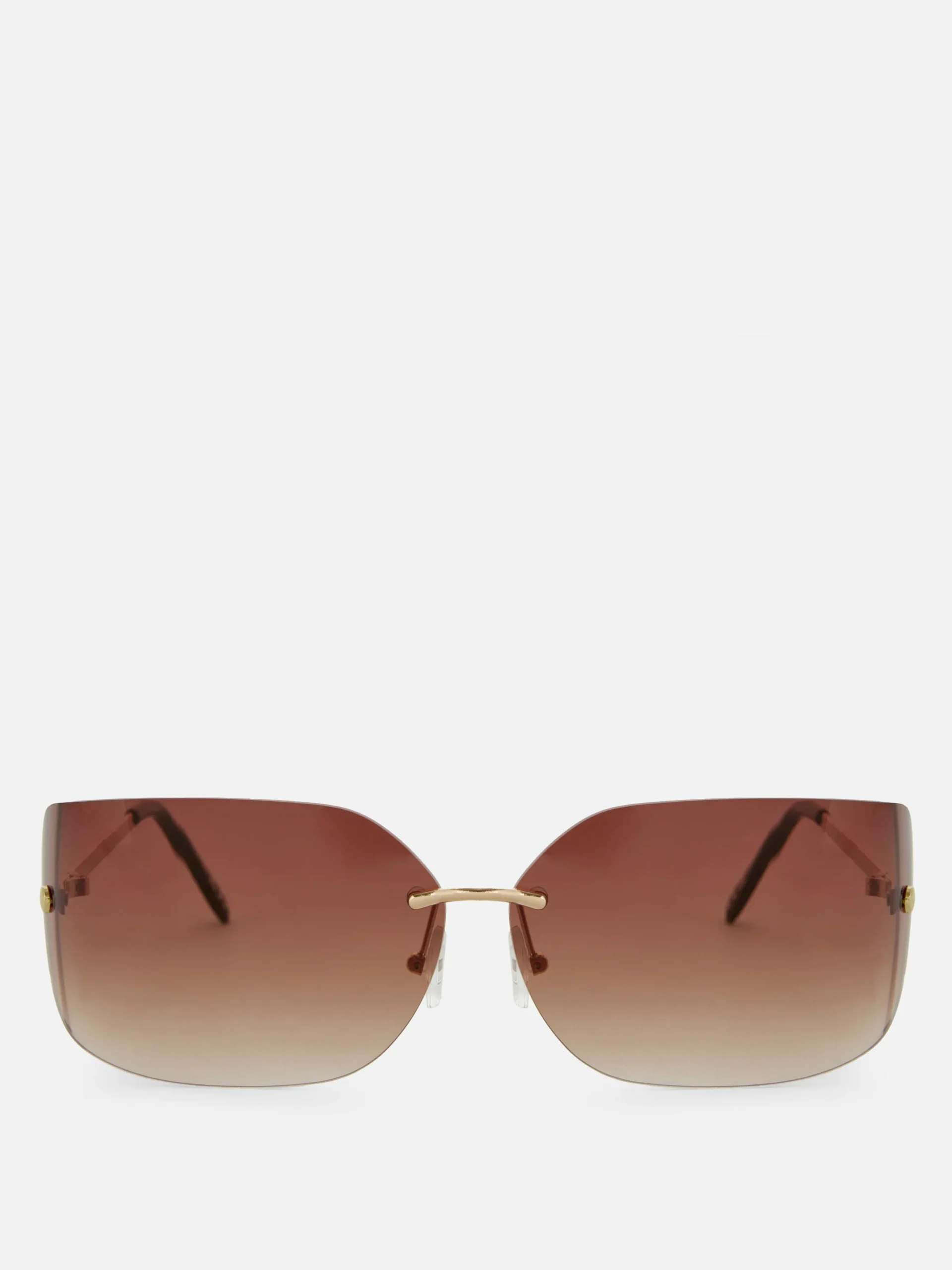 Rita Ora Curved Rimless Sunglasses